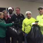 Diane Sheridan, Sterling House director of Community Development, and Sue Kostopoulos of the Stratford Junior Women’s Club, join with Carl Stevens, Peter Carroll, Nick Paundlay, and Tom Sportini of the International Brotherhood of Electrical Workers union as they deliver Christmas gifts to Stratford homes. — Contributed photo